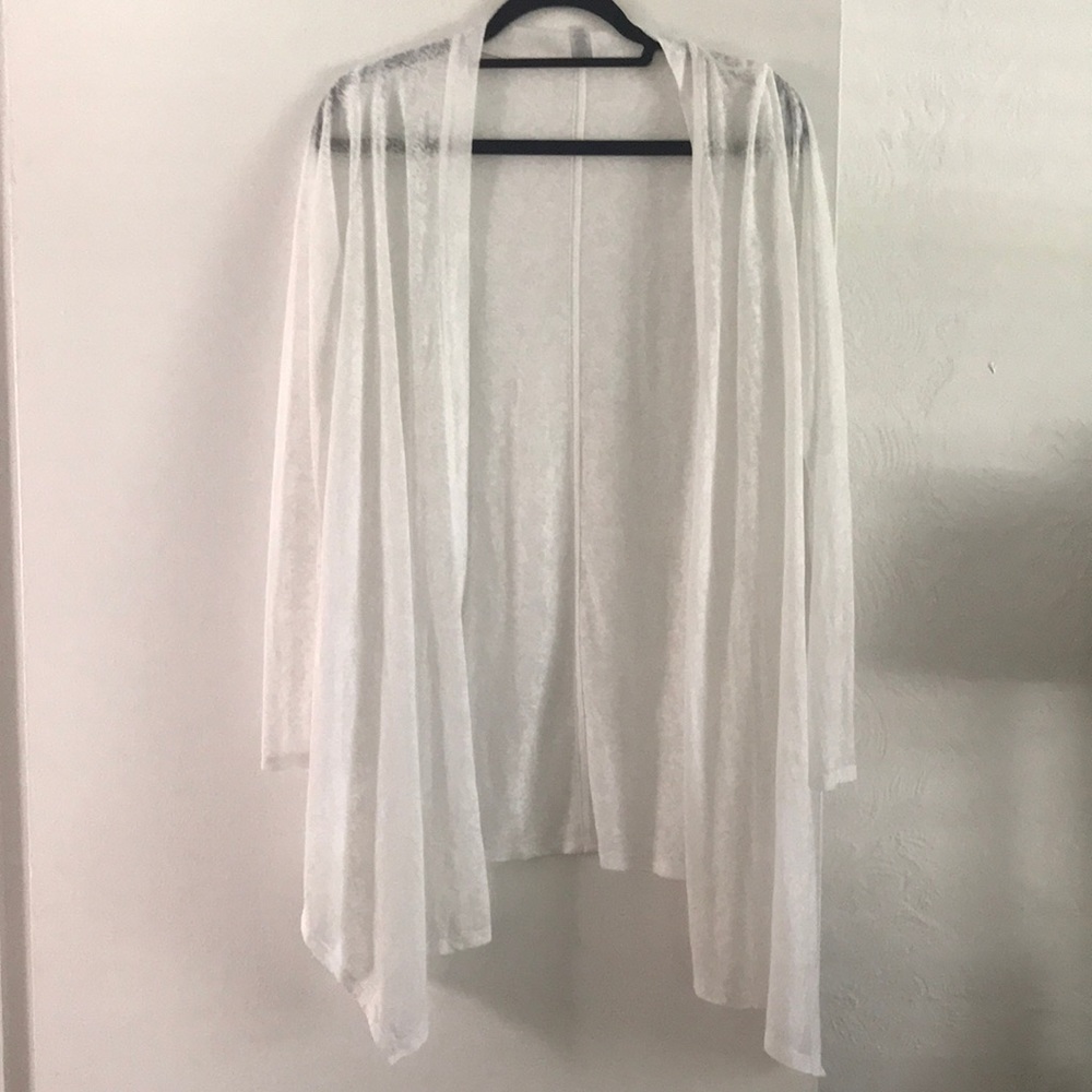 Tee Shoo. Very cute light weight cardigan. White burn-out fabric.